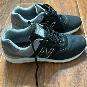 New Balance 574 Reengineered. Mens size 9.5. Black/gray. Used.